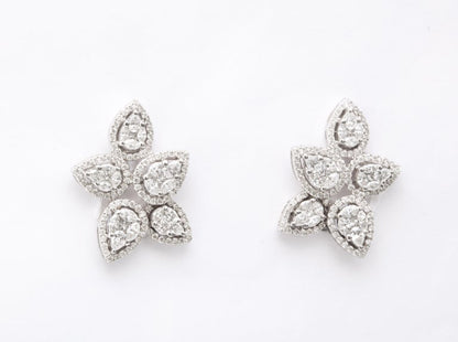 https://a.1stdibscdn.com/diamond-cluster-earrings-for-sale-picture-2/j_415/j_140275121637953079829/6R1A1259_master.jpg?width=768