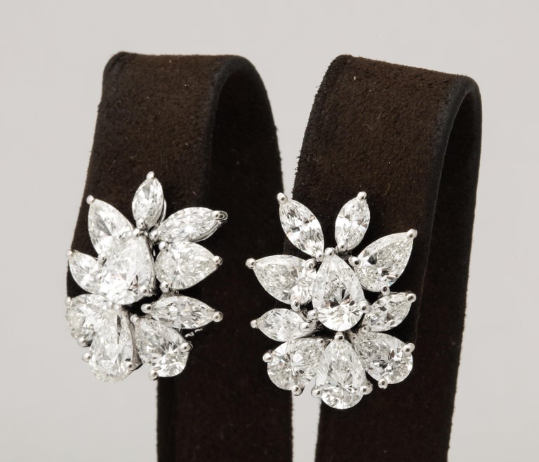https://a.1stdibscdn.com/diamond-cluster-earrings-for-sale-picture-2/j_415/j_172984621666015948628/6R1A1301_master.jpg?width=768