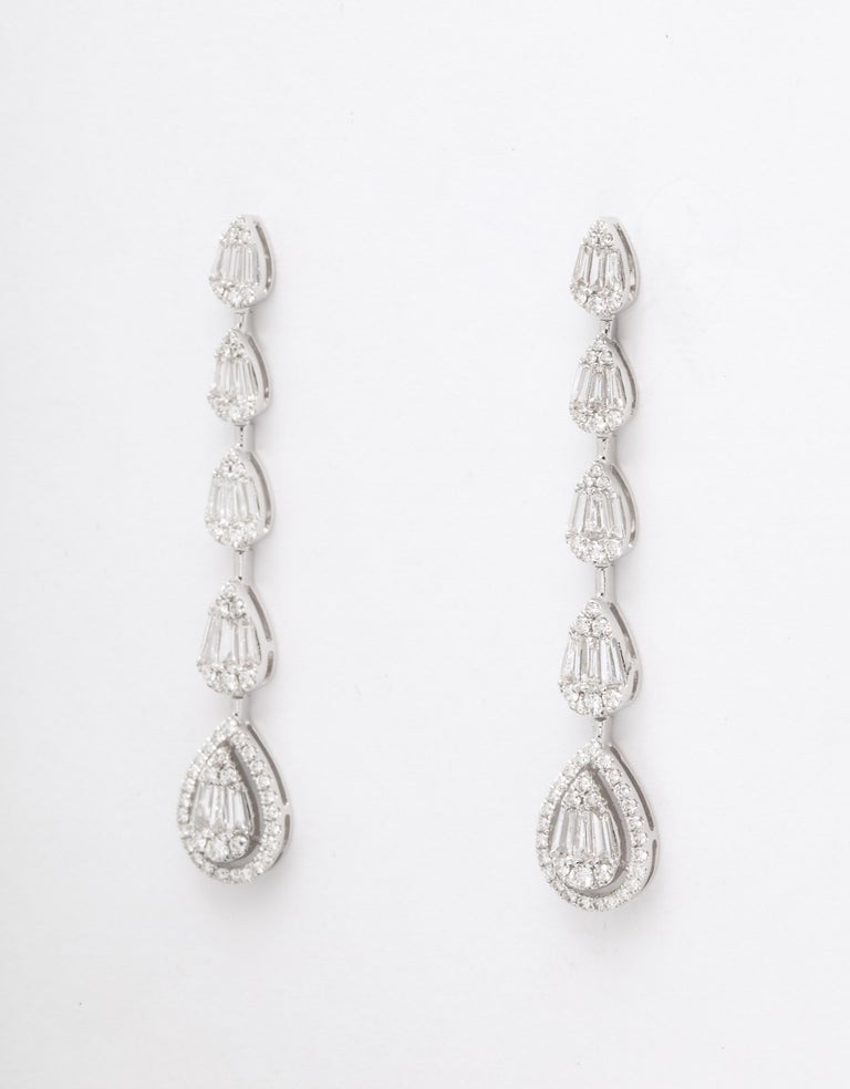 https://a.1stdibscdn.com/diamond-drop-earrings-for-sale-picture-6/j_415/j_140276021637953977628/6R1A1337_master.jpg?width=768