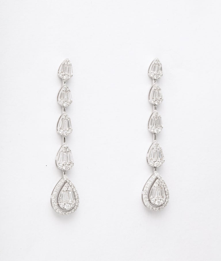 https://a.1stdibscdn.com/diamond-drop-earrings-for-sale-picture-7/j_415/j_140276021637953977627/6R1A1340_master.jpg?width=768