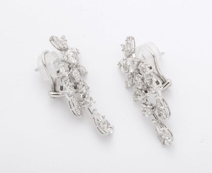 https://a.1stdibscdn.com/diamond-cluster-dangle-earring-for-sale-picture-7/j_415/j_160698521655143269510/6R1A1380_master.jpg?width=768