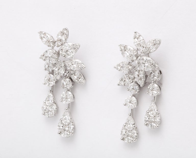 https://a.1stdibscdn.com/diamond-cluster-dangle-earring-for-sale-picture-5/j_415/j_160698521655143274069/6R1A1393_master.jpg?width=768
