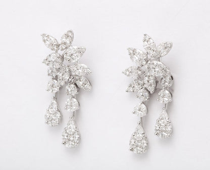 https://a.1stdibscdn.com/diamond-cluster-dangle-earring-for-sale-picture-5/j_415/j_160698521655143274069/6R1A1393_master.jpg?width=768