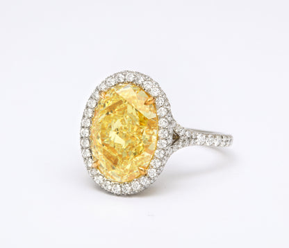 https://a.1stdibscdn.com/gia-certified-6-carat-oval-fancy-yellow-diamond-ring-for-sale-picture-5/j_415/j_129688521628091733605/6R1A2497_master.jpg