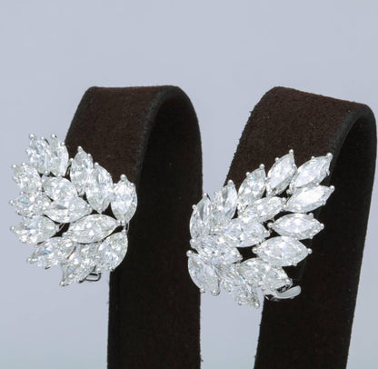 https://a.1stdibscdn.com/diamond-cluster-earrings-for-sale-picture-3/archivesE/upload/0/j_41520831523637144506/6R1A2644_master.jpg?width=768