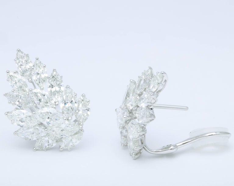 https://a.1stdibscdn.com/diamond-cluster-earrings-for-sale-picture-4/archivesE/upload/0/j_41520831523637146567/6R1A2648_master.jpg?width=768
