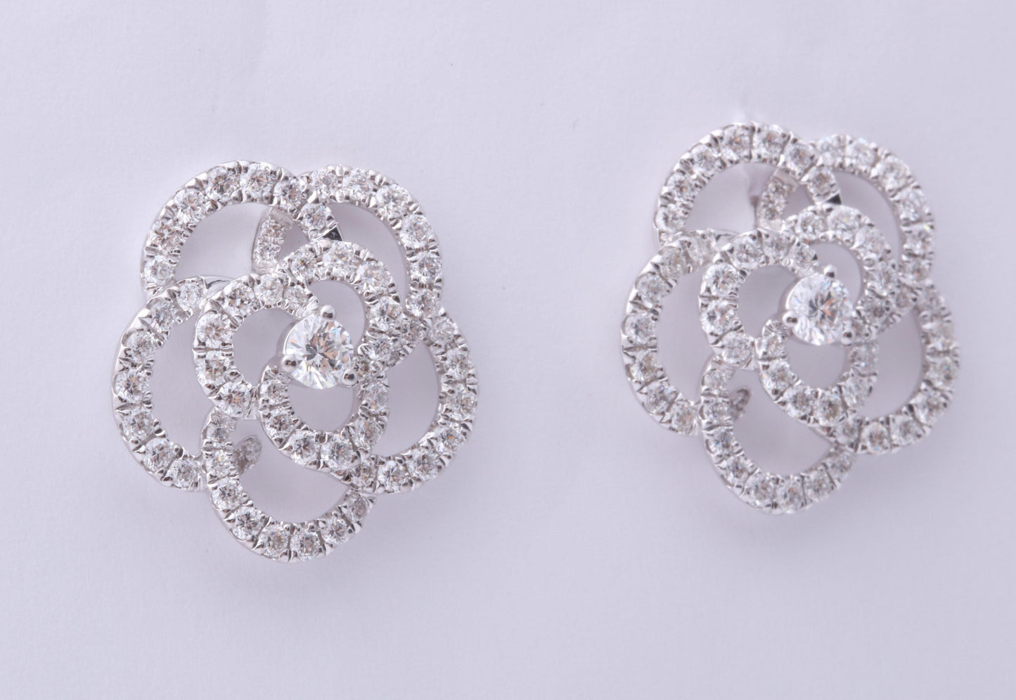 https://a.1stdibscdn.com/diamond-camelia-flower-earrings-for-sale-picture-6/j_415/j_279083721763483498598/6R1A3318_master.jpg