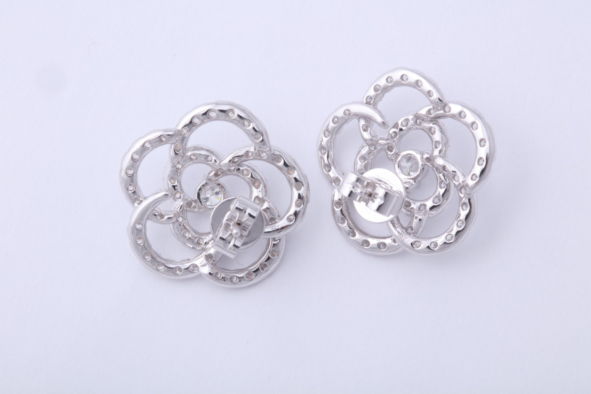 https://a.1stdibscdn.com/diamond-camelia-flower-earrings-for-sale-picture-7/j_415/j_279083721763483499548/6R1A3321_master.jpg