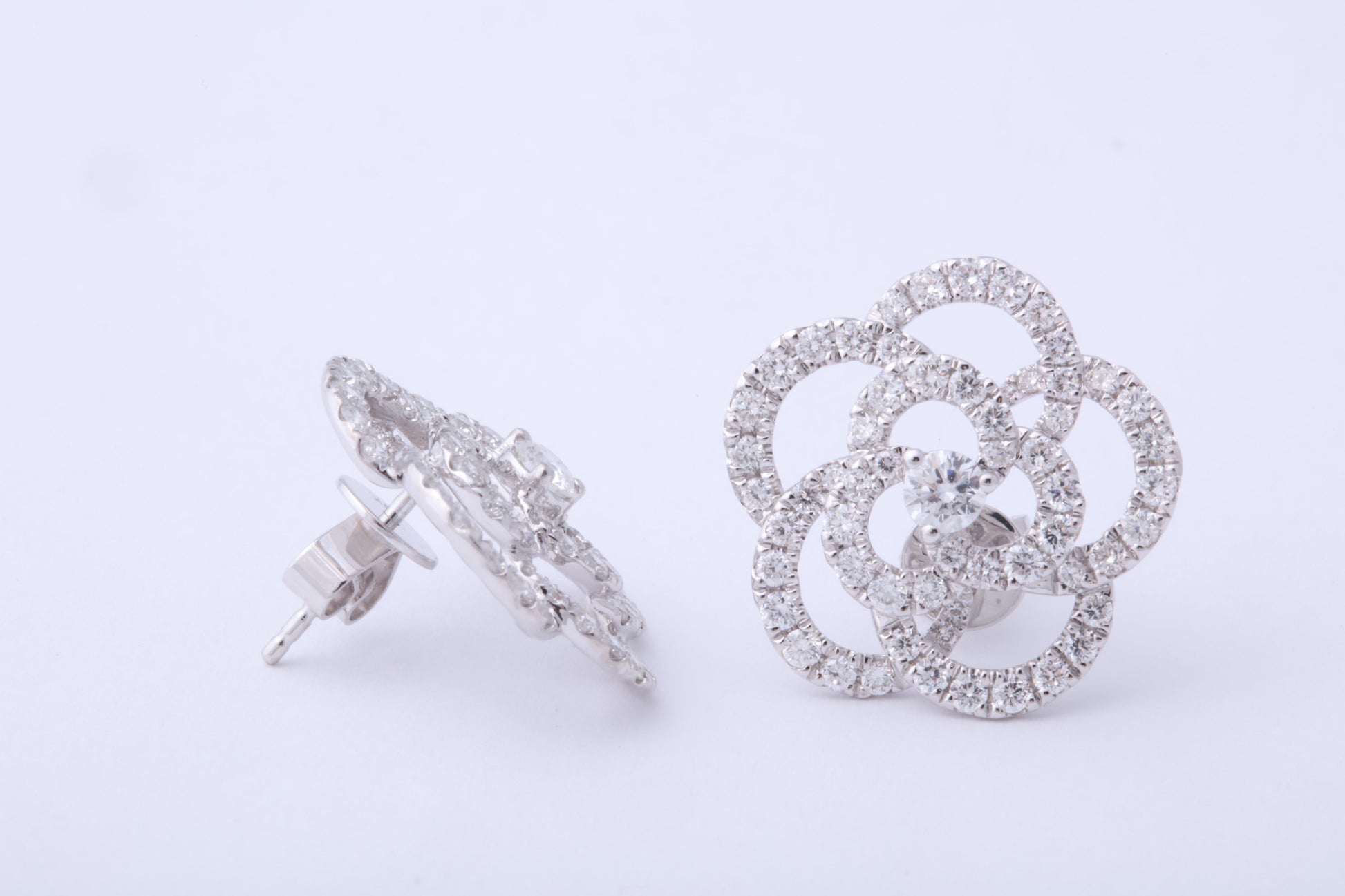 https://a.1stdibscdn.com/diamond-camelia-flower-earrings-for-sale-picture-8/j_415/j_279083721763483500455/6R1A3325_master.jpg