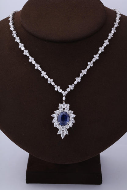 https://a.1stdibscdn.com/vivid-blue-ceylon-sapphire-and-diamond-pendant-necklace-for-sale-picture-3/0/j_56032021544653090604/6R1A3347_master.jpg