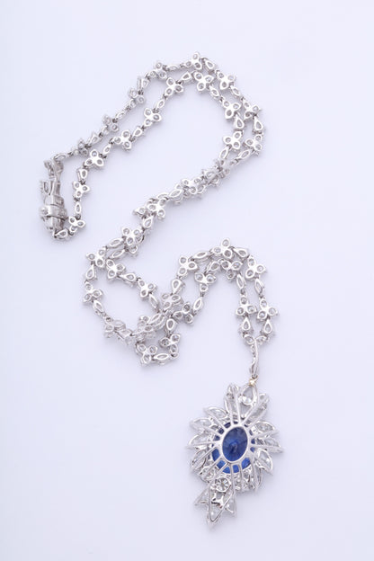 https://a.1stdibscdn.com/vivid-blue-ceylon-sapphire-and-diamond-pendant-necklace-for-sale-picture-5/0/j_56032021544653094354/6R1A3353_master.jpg