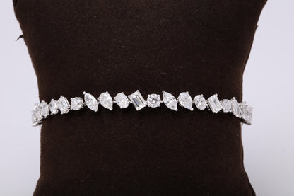 https://a.1stdibscdn.com/multi-shape-diamond-tennis-bracelet-for-sale-picture-4/0/j_57882221547578602601/6R1A3396_master.jpg