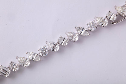 https://a.1stdibscdn.com/multi-shape-diamond-tennis-bracelet-for-sale-picture-7/366869/j_57882221553111360670/6R1A3407_org_master.jpg