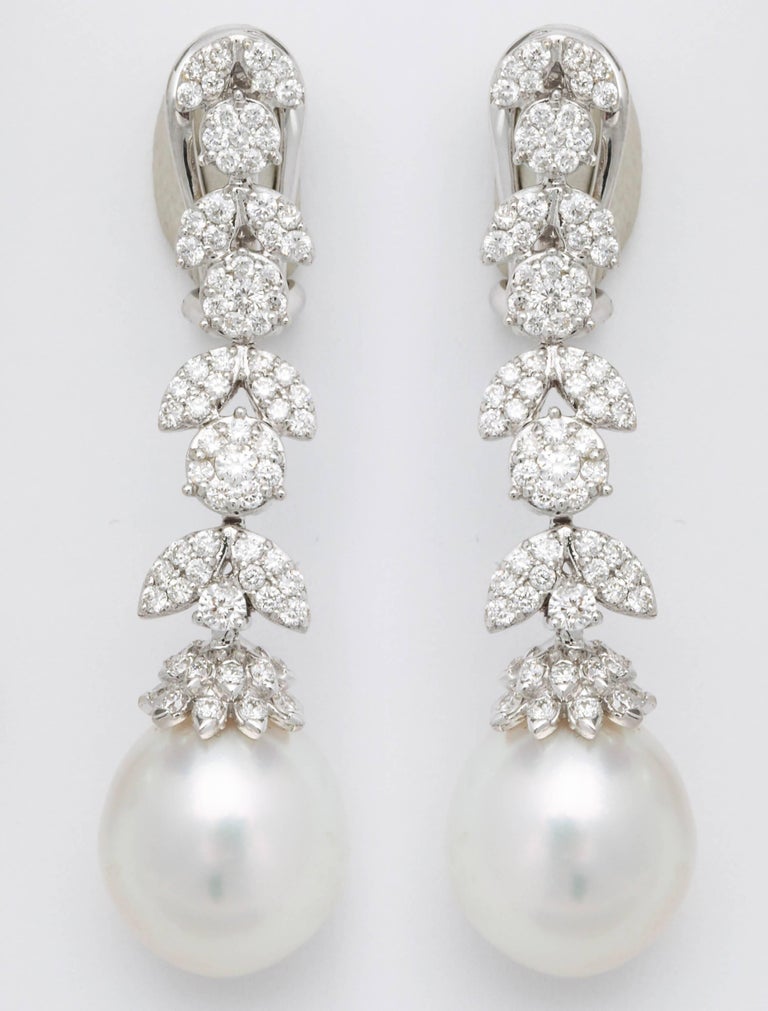 https://a.1stdibscdn.com/pearl-and-diamond-earrings-for-sale-picture-3/j_415/j_193187421684333967244/6R1A3813_master.jpg?width=768