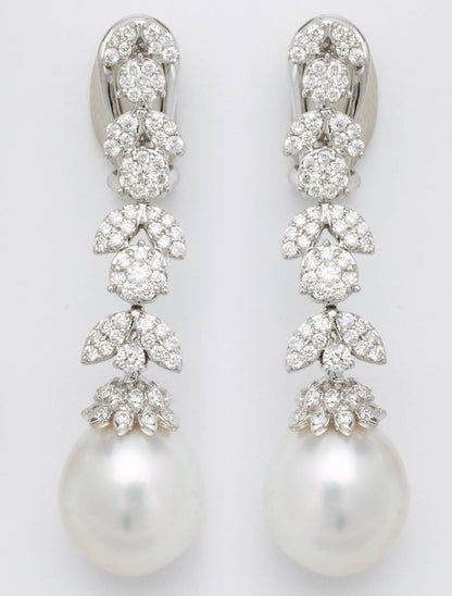 https://a.1stdibscdn.com/pearl-and-diamond-earrings-for-sale-picture-3/j_415/j_193187421684333967244/6R1A3813_master.jpg?width=768