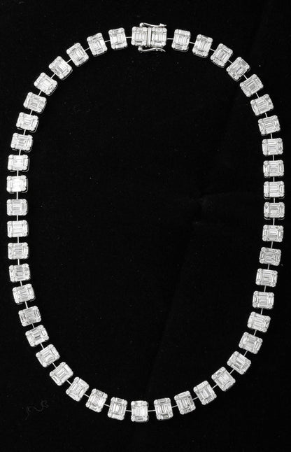 https://a.1stdibscdn.com/emerald-cut-diamond-necklace-illusion-set-for-sale-picture-4/j_415/j_99658421595349089560/6R1A3824_master.jpg?width=768