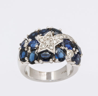 https://a.1stdibscdn.com/sapphire-and-diamond-shooting-star-cocktail-ring-for-sale-picture-5/j_415/1618934647021/6R1A4925_master.jpg