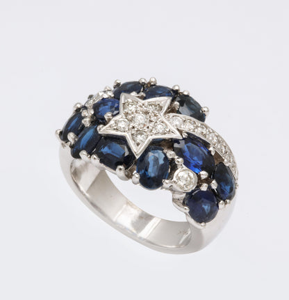 https://a.1stdibscdn.com/sapphire-and-diamond-shooting-star-cocktail-ring-for-sale-picture-6/j_415/1618934649236/6R1A4926_master.jpg