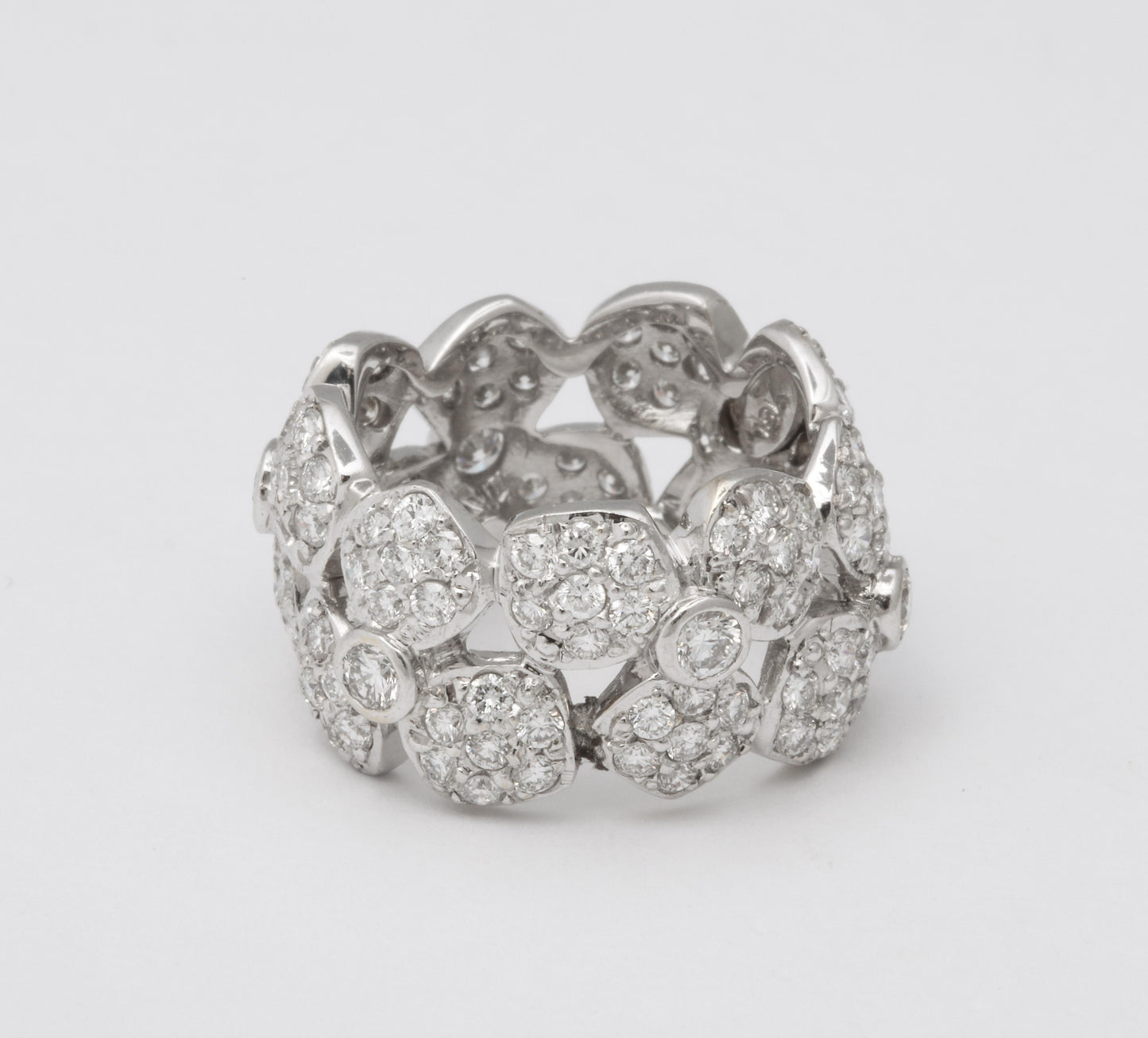 https://a.1stdibscdn.com/wide-diamond-flower-band-for-sale-picture-2/j_415/j_133715621632146837037/6R1A4962_master.jpg