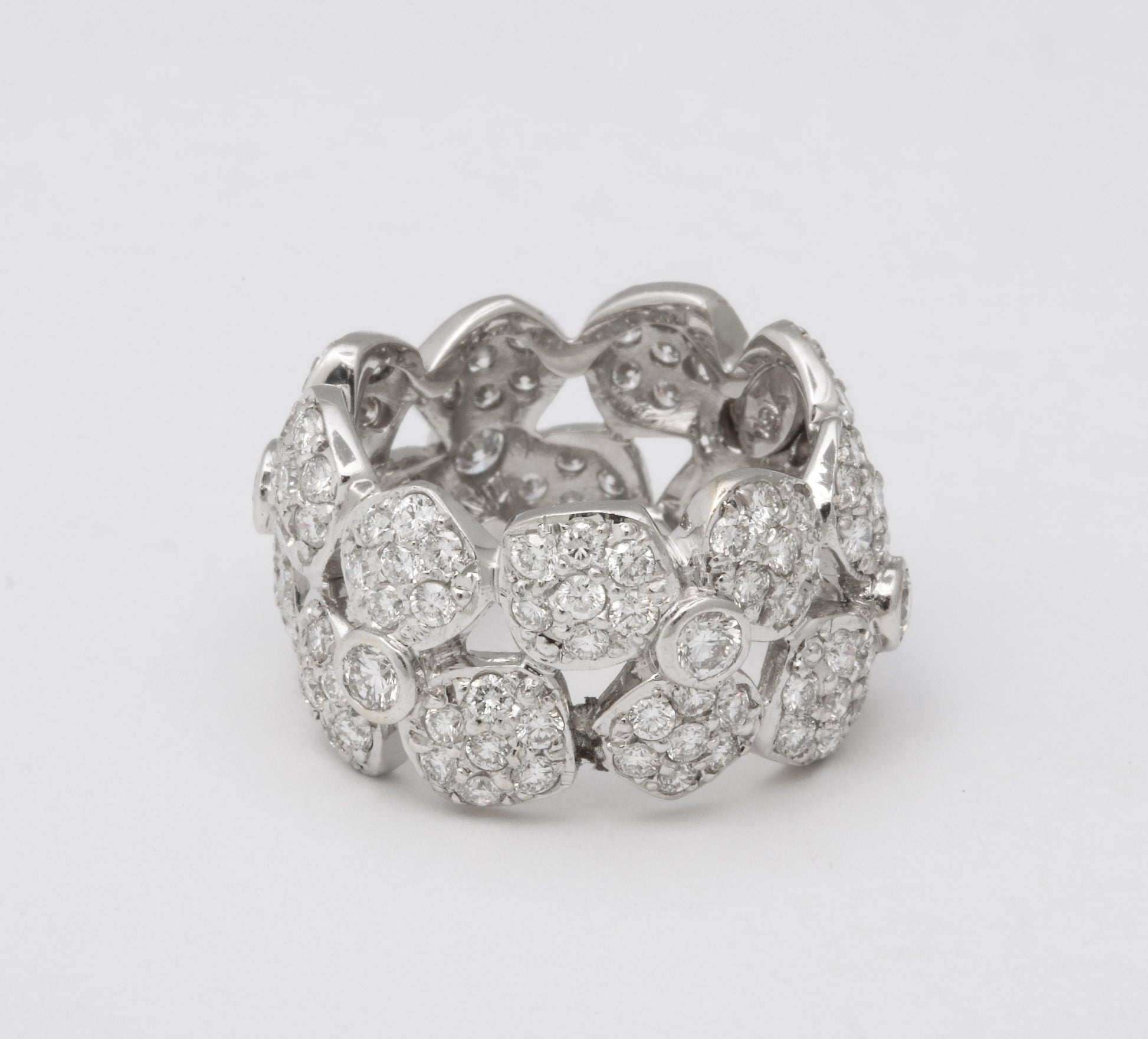 https://a.1stdibscdn.com/wide-diamond-flower-band-for-sale-picture-2/j_415/j_133715621632146837037/6R1A4962_master.jpg