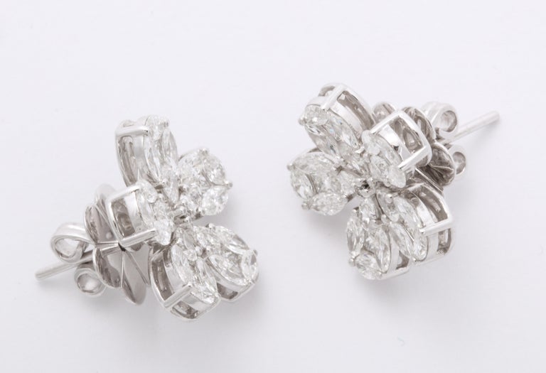 https://a.1stdibscdn.com/diamond-flower-earrings-for-sale-picture-7/j_415/1575403239864/6R1A5030_master.jpg?width=768