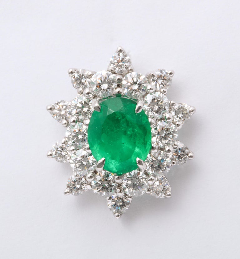 https://a.1stdibscdn.com/emerald-and-diamond-earrings-for-sale-picture-5/j_415/1575403454180/6R1A5052_master.jpg?width=768