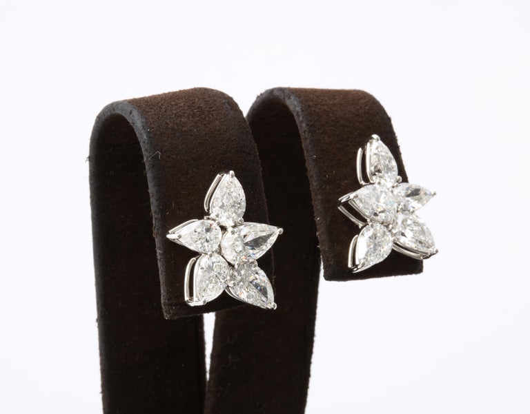 https://a.1stdibscdn.com/cluster-diamond-earrings-for-sale-picture-4/j_415/j_167933421661437836675/6R1A5077_master.jpg?width=768