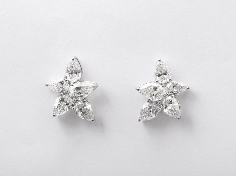 https://a.1stdibscdn.com/cluster-diamond-earrings-for-sale-picture-5/j_415/j_167933421661437836744/6R1A5079_master.jpg?width=768