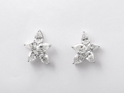 https://a.1stdibscdn.com/cluster-diamond-earrings-for-sale-picture-5/j_415/j_167933421661437836744/6R1A5079_master.jpg?width=768