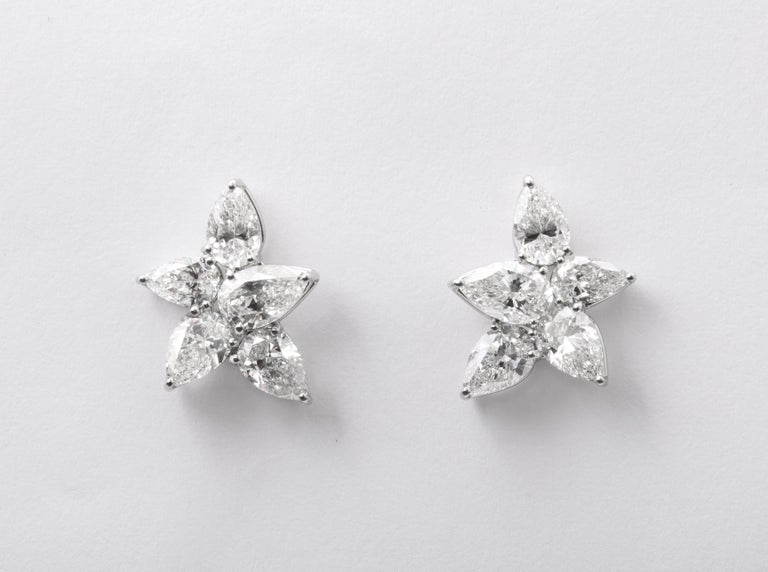 https://a.1stdibscdn.com/cluster-diamond-earrings-for-sale-picture-6/j_415/j_167933421661437836741/6R1A5080_master.jpg?width=768