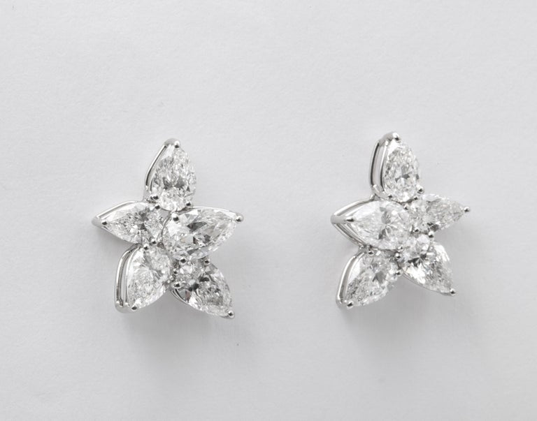 https://a.1stdibscdn.com/cluster-diamond-earrings-for-sale-picture-7/j_415/j_167933421661437836743/6R1A5081_master.jpg?width=768
