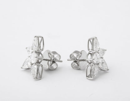 https://a.1stdibscdn.com/cluster-diamond-earrings-for-sale-picture-8/j_415/j_167933421661437842771/6R1A5084_master.jpg?width=768