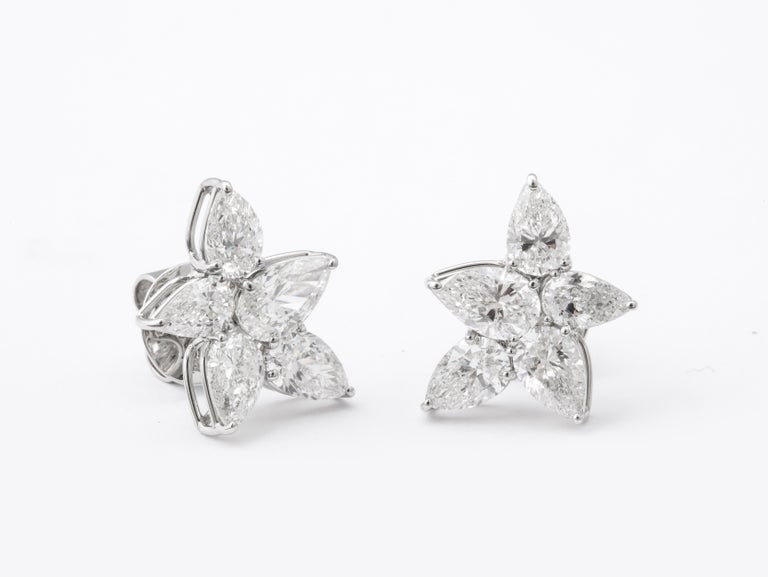 https://a.1stdibscdn.com/cluster-diamond-earrings-for-sale-picture-10/j_415/j_167933421661437842710/6R1A5089_master.jpg?width=768