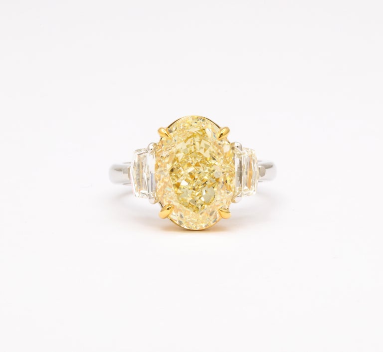 https://a.1stdibscdn.com/6-carat-oval-yellow-diamond-ring-gia-certified-for-sale-picture-3/j_415/j_180650221672242089905/6R1A5231_master.jpg?width=768