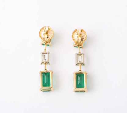 https://a.1stdibscdn.com/emerald-and-diamond-dangle-drop-earrings-for-sale-picture-7/j_415/j_180977921672758061894/6R1A5271_master.jpg?width=768