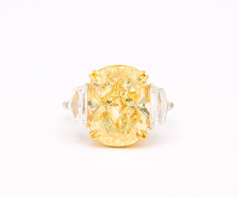 https://a.1stdibscdn.com/10-carat-fancy-yellow-diamond-ring-for-sale-picture-3/j_415/j_194448221685540806778/6R1A5463_master.jpg?width=768