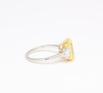 https://a.1stdibscdn.com/fancy-vivid-yellow-emerald-cut-ring-for-sale-picture-5/j_415/j_174482921667400162735/6R1A5483_master.jpg?width=768