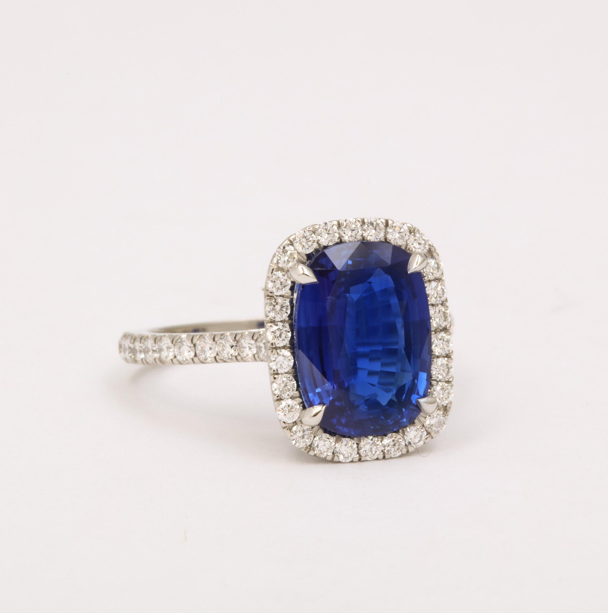 https://a.1stdibscdn.com/cushion-cut-blue-sapphire-and-diamond-halo-ring-for-sale-picture-4/j_415/j_194450021685541114442/6R1A5484_master.jpg