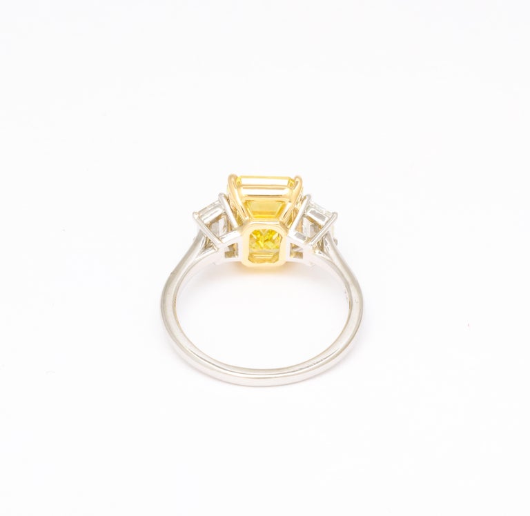 https://a.1stdibscdn.com/fancy-vivid-yellow-emerald-cut-ring-for-sale-picture-6/j_415/j_174482921667400159831/6R1A5484_master.jpg?width=768