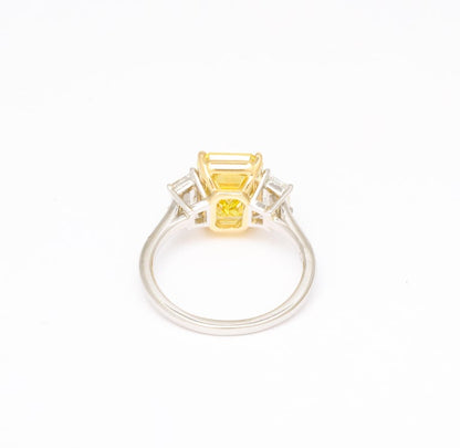 https://a.1stdibscdn.com/fancy-vivid-yellow-emerald-cut-ring-for-sale-picture-6/j_415/j_174482921667400159831/6R1A5484_master.jpg?width=768