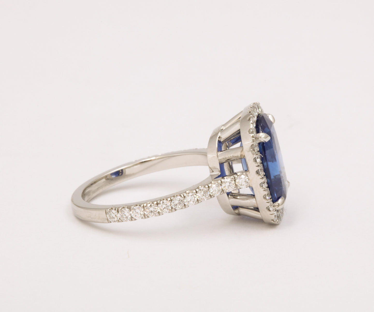 https://a.1stdibscdn.com/cushion-cut-blue-sapphire-and-diamond-halo-ring-for-sale-picture-5/j_415/j_194450021685541114504/6R1A5485_master.jpg