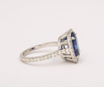 https://a.1stdibscdn.com/cushion-cut-blue-sapphire-and-diamond-halo-ring-for-sale-picture-5/j_415/j_194450021685541114504/6R1A5485_master.jpg