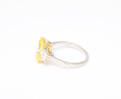 https://a.1stdibscdn.com/fancy-vivid-yellow-emerald-cut-ring-for-sale-picture-7/j_415/j_174482921667400163344/6R1A5485_master.jpg?width=768