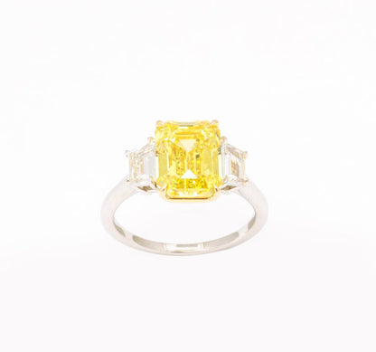 https://a.1stdibscdn.com/fancy-vivid-yellow-emerald-cut-ring-for-sale-picture-9/j_415/j_174482921667400158939/6R1A5488_master.jpg?width=768