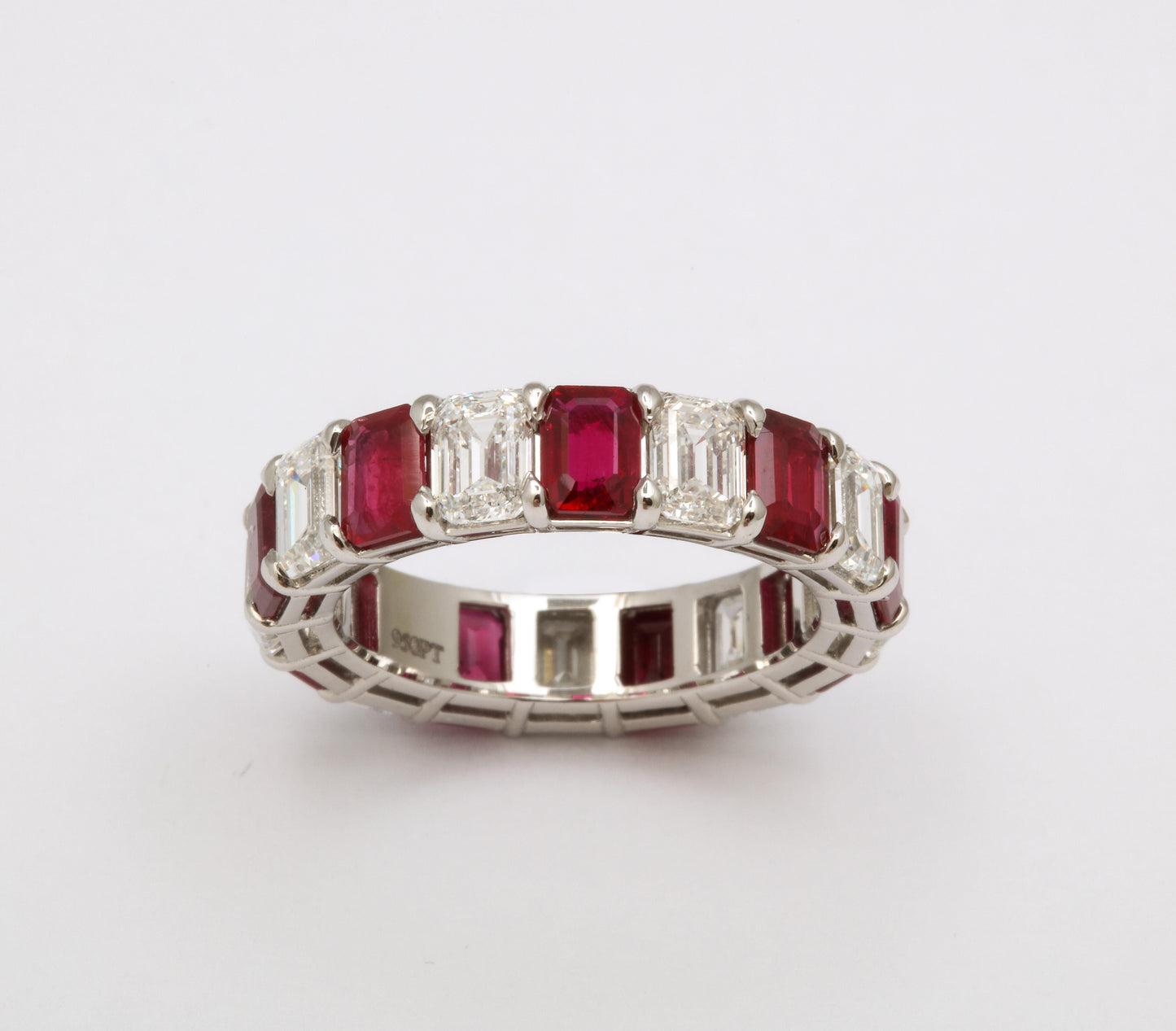 https://a.1stdibscdn.com/emerald-ruby-and-sapphire-emerald-cut-diamond-eternity-bands-for-sale-picture-7/j_415/j_174383521667319186258/6R1A5502_master.jpg