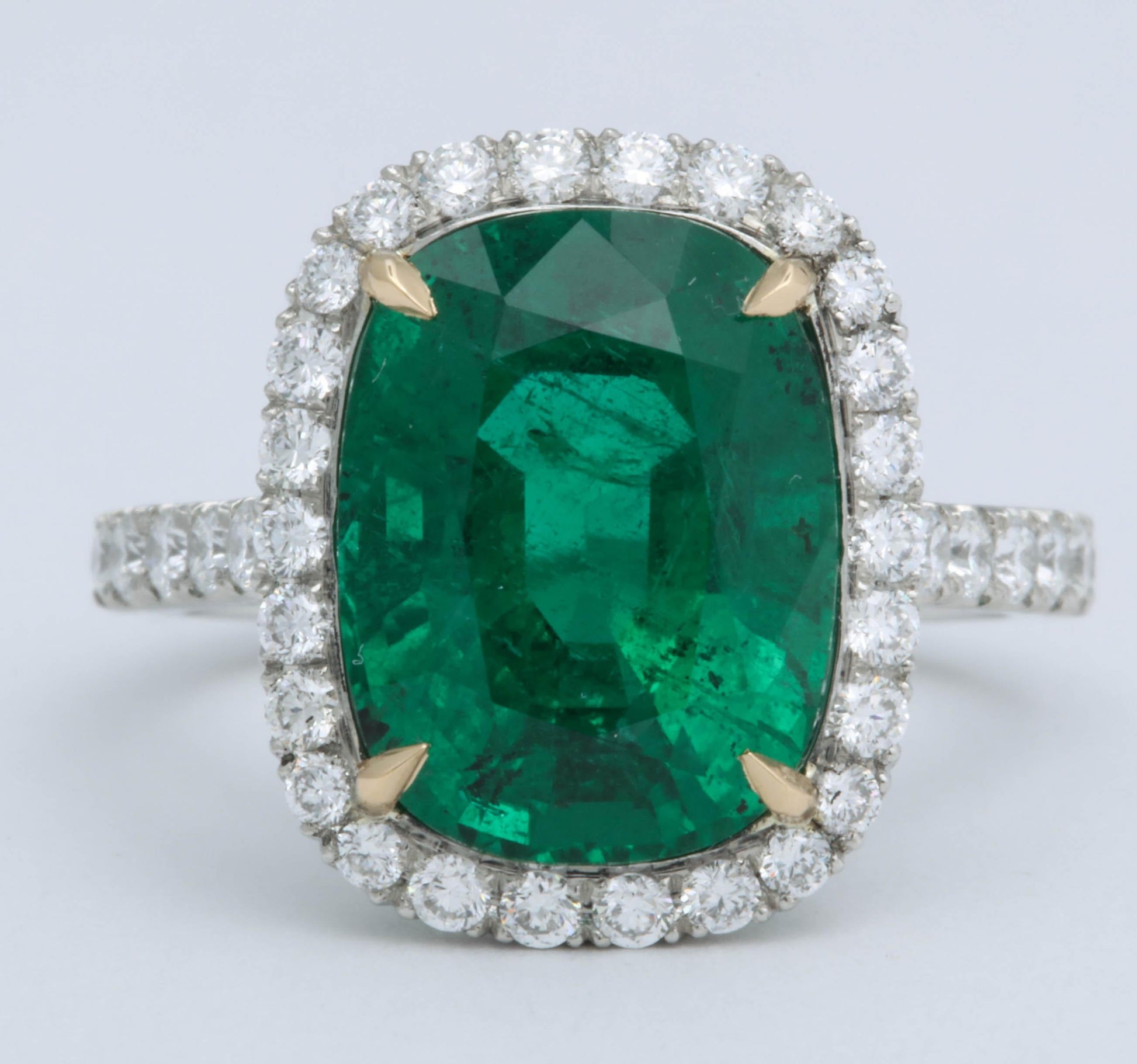 https://a.1stdibscdn.com/5-carat-green-emerald-cushion-cut-diamond-halo-ring-gia-certified-no-oil-for-sale-picture-2/0/j_48413131535730117982/6R1A5985_master.jpg