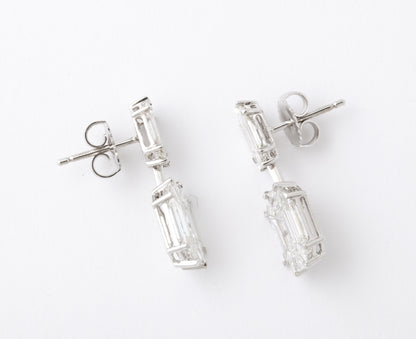 https://a.1stdibscdn.com/emerald-cut-illusion-diamond-dangle-drop-earring-for-sale-picture-6/j_415/j_174040221666970802140/6R1A5989_master.jpg