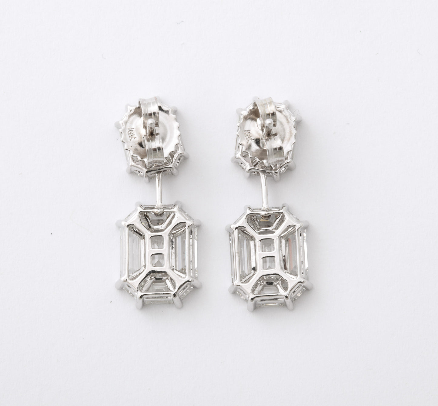 https://a.1stdibscdn.com/emerald-cut-illusion-diamond-dangle-drop-earring-for-sale-picture-8/j_415/j_174040221666970803690/6R1A5992_master.jpg