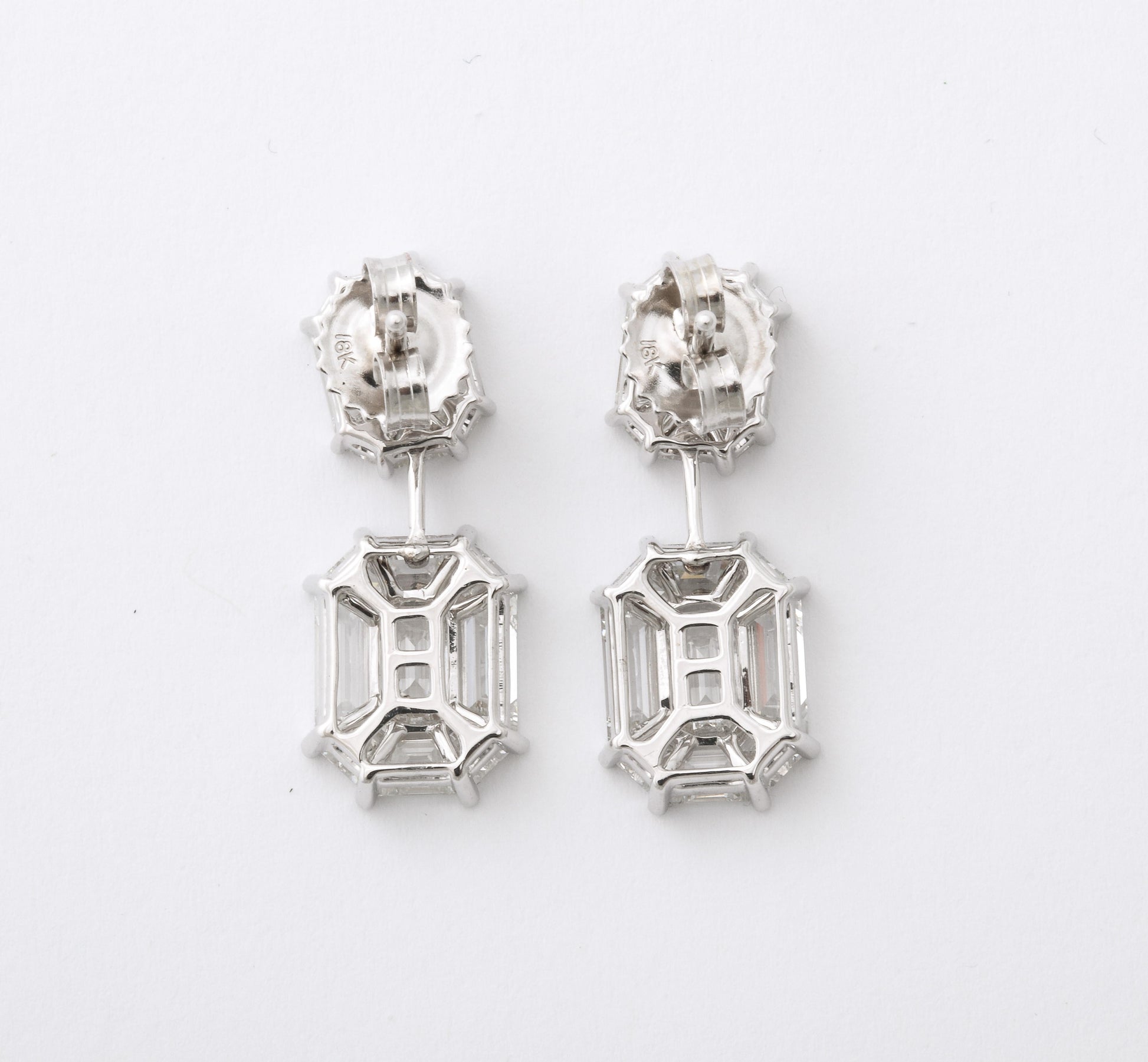 https://a.1stdibscdn.com/emerald-cut-illusion-diamond-dangle-drop-earring-for-sale-picture-8/j_415/j_174040221666970803690/6R1A5992_master.jpg