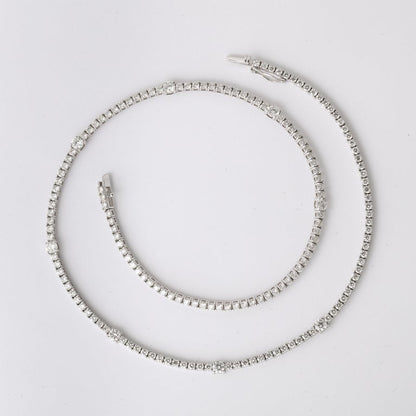 https://a.1stdibscdn.com/diamond-tennis-necklace-for-sale-picture-8/j_415/j_166501421659967984708/6R1A6030_master.jpg?width=768